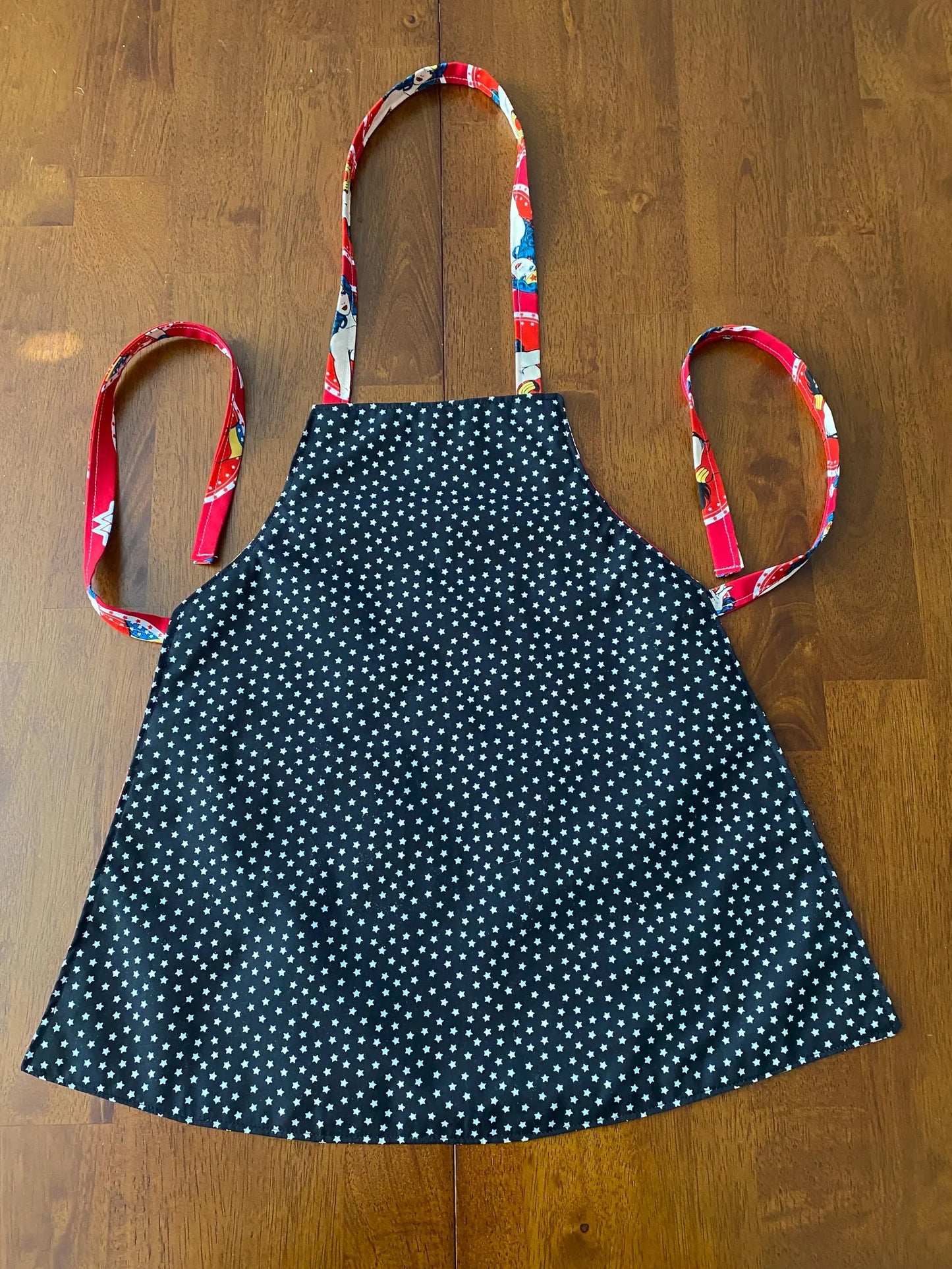 Reversible Child Apron with Pockets Featuring Wonder Women