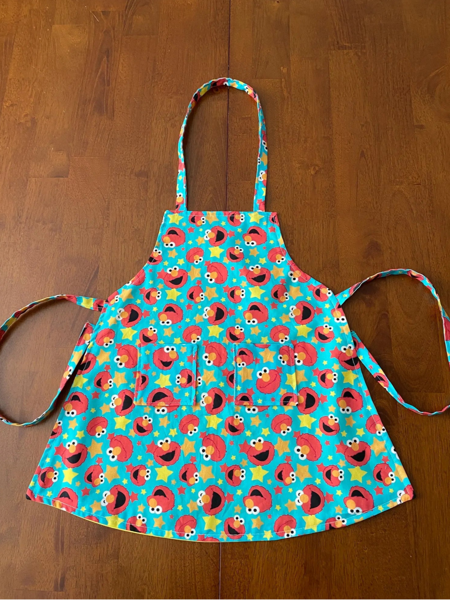 Reversible Child Apron with Pockets Featuring Elmo