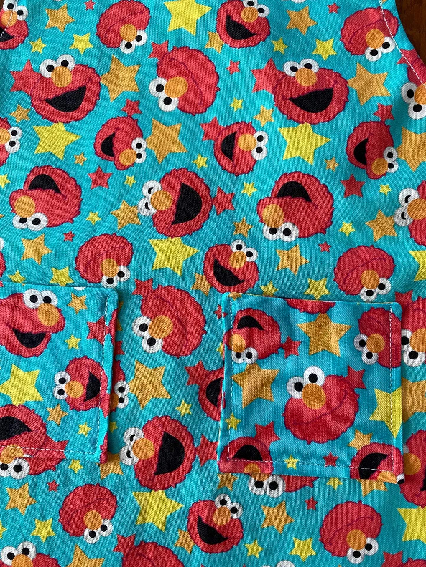 Reversible Child Apron with Pockets Featuring Elmo