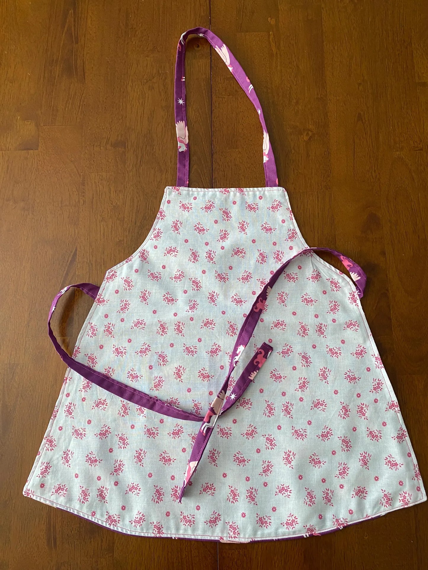 Reversible Child Apron with Pockets Featuring Pegasus
