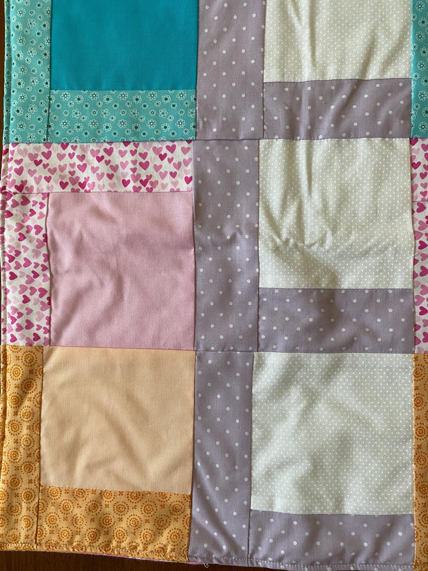 Handmade Baby Doll Quilted Blanket with Colorful Blocks and Purple Rows