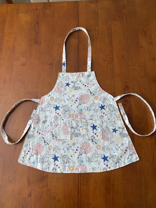 Reversible Child Apron with Pockets Featuring Toy Story