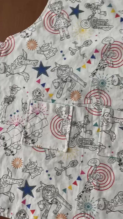 Reversible Child Apron with Pockets Featuring Toy Story
